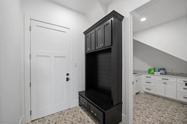 a hallway with cabinets