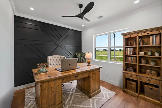 a workspace with furniture and window