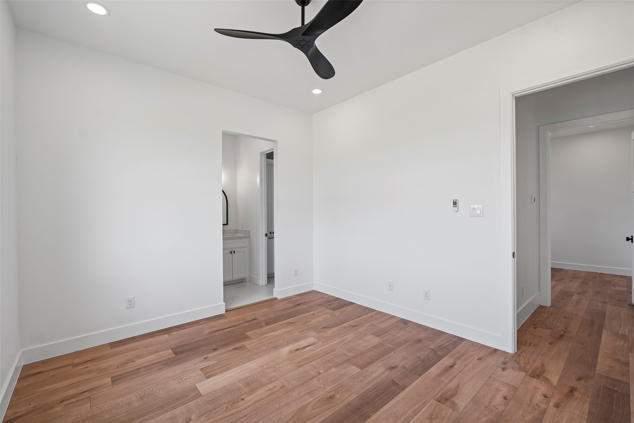 413 Chuckwagon Trail Angleton, TX 77515 - Photo 45 of 46 a view of empty room with wooden floor