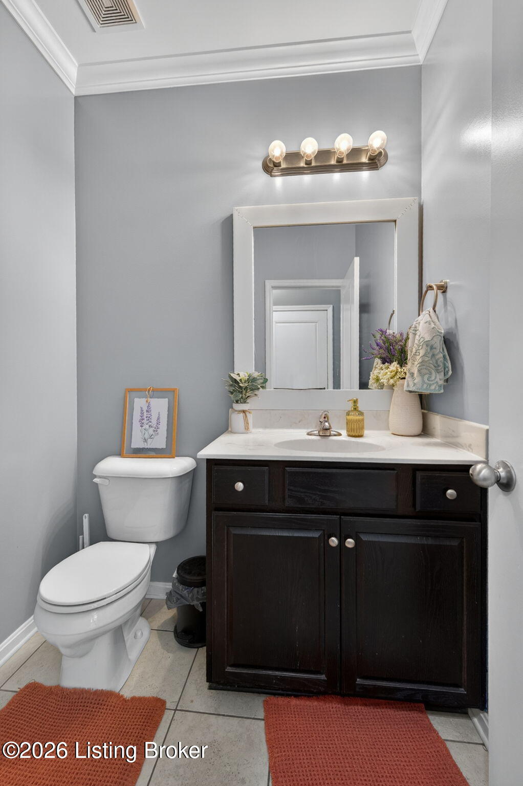 142 Highland Ridge Drive Mount Washington, KY 40047 - Photo 23 of 61 The adjacent half bath features a dark vanity paired with a light countertop for contrast and balance; a framed mirror and updated lighting complete the space with a clean, refreshed feel