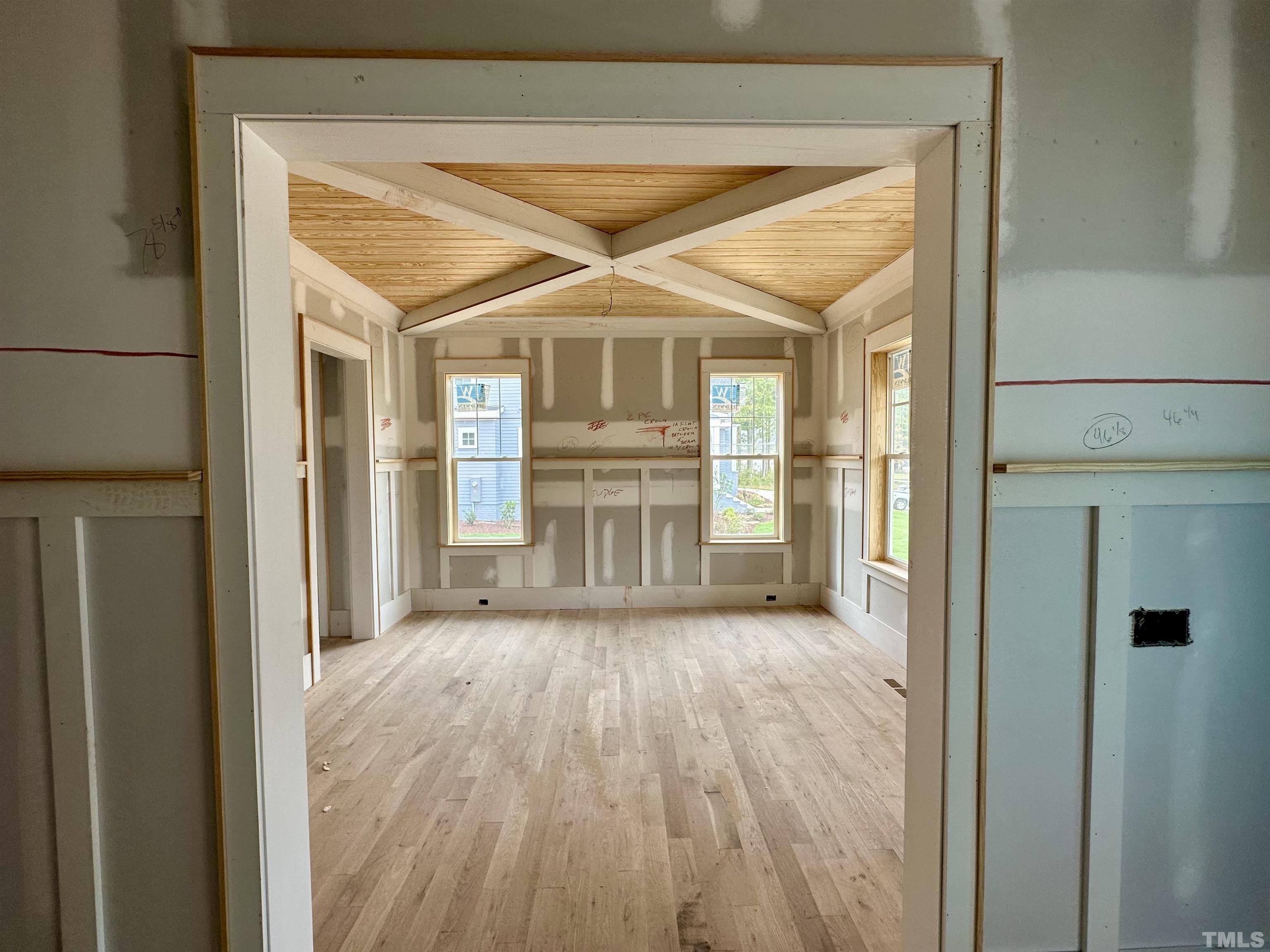 1509 Starry Night Court Raleigh, NC 27613 - Photo 14 of 14 a view of a livingroom with wooden floor and a window