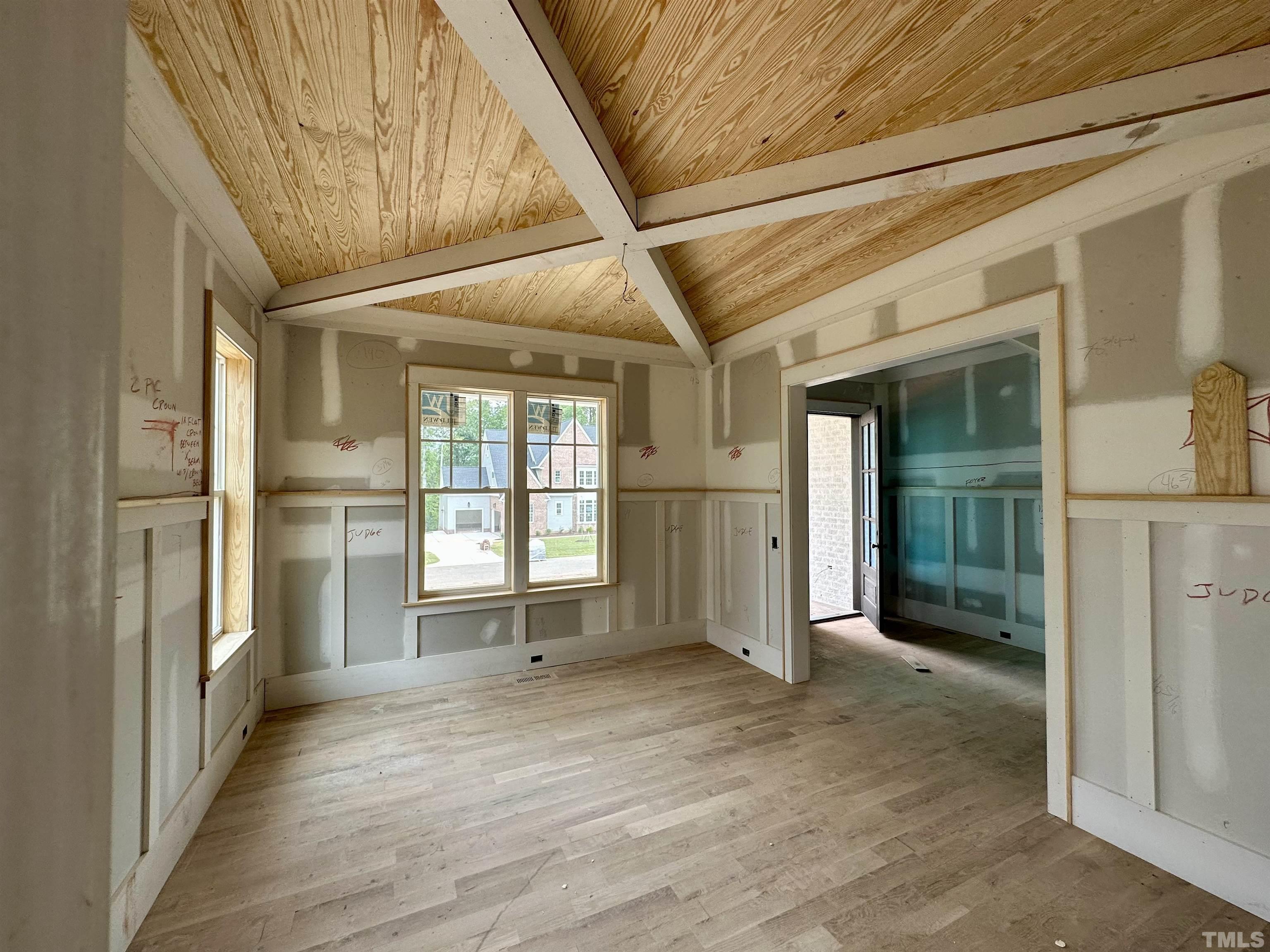 1509 Starry Night Court Raleigh, NC 27613 - Photo 9 of 14 a view of empty room with wooden floor and fan