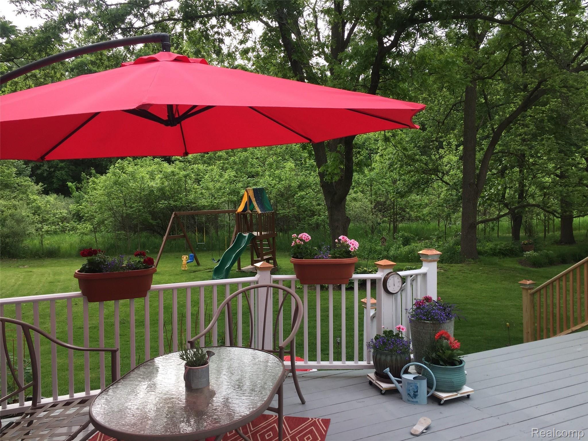 239 Fairhill Way Howell, MI 48843 - Photo 24 of 27 Relax with a cool drink, good friends on warm summer night.