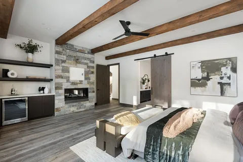 a spacious bathroom with a sink and a large mirror
