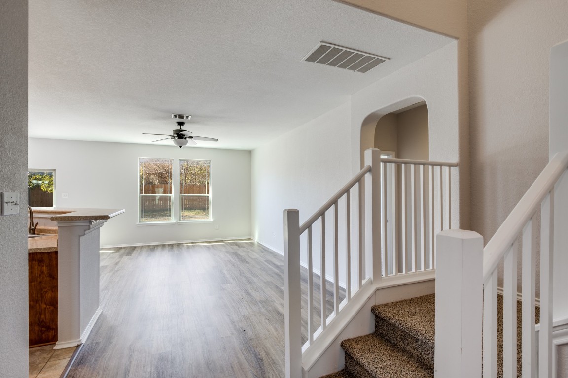 211 Mancos Drive Georgetown, TX 78626 - Photo 2 of 25 a view of entryway and hall with wooden floor