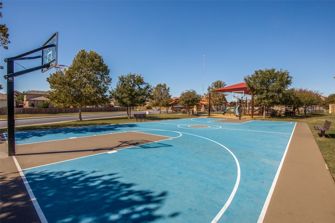 211 Mancos Drive Georgetown, TX 78626 - Photo 23 of 25 a view of a playground with basketball court
