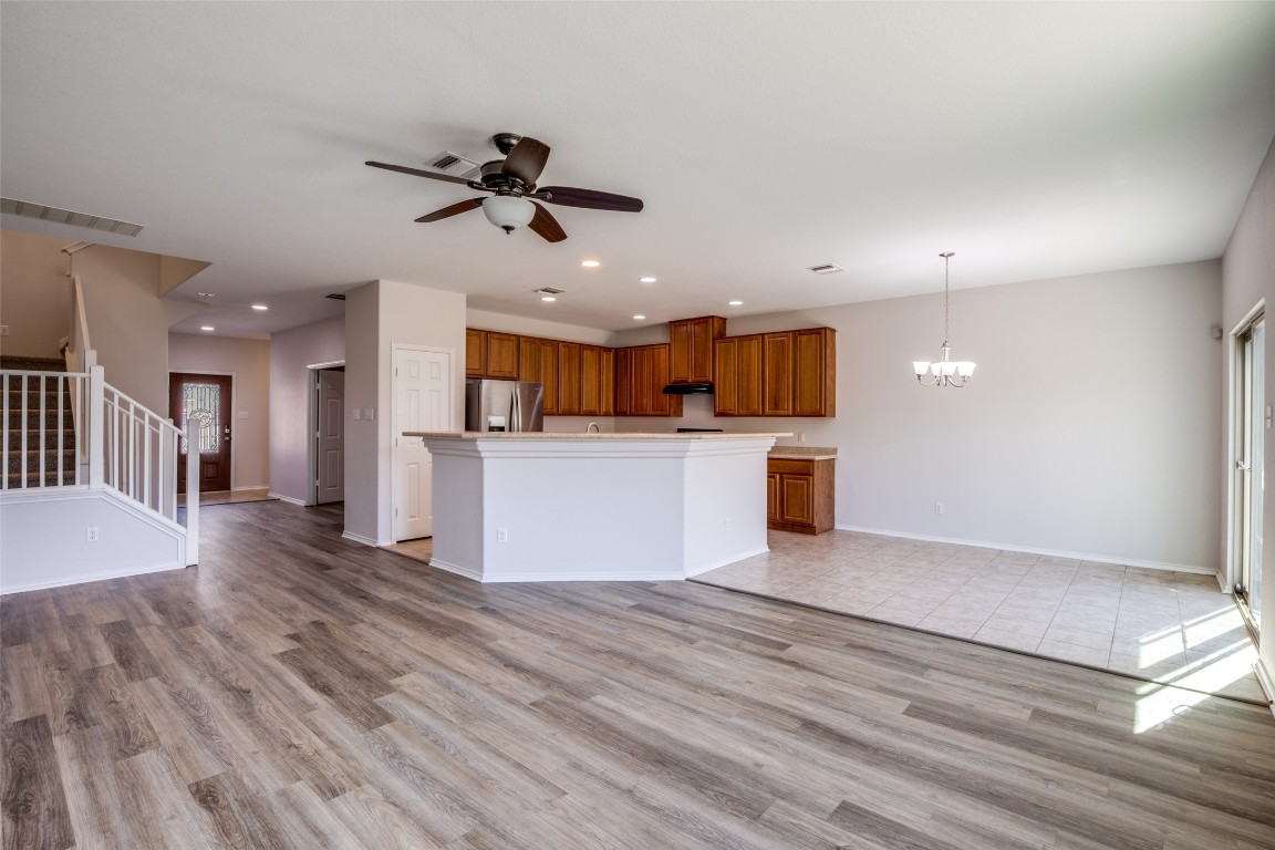 211 Mancos Drive Georgetown, TX 78626 - Photo 25 of 25 a view of a kitchen with a sink and microwave