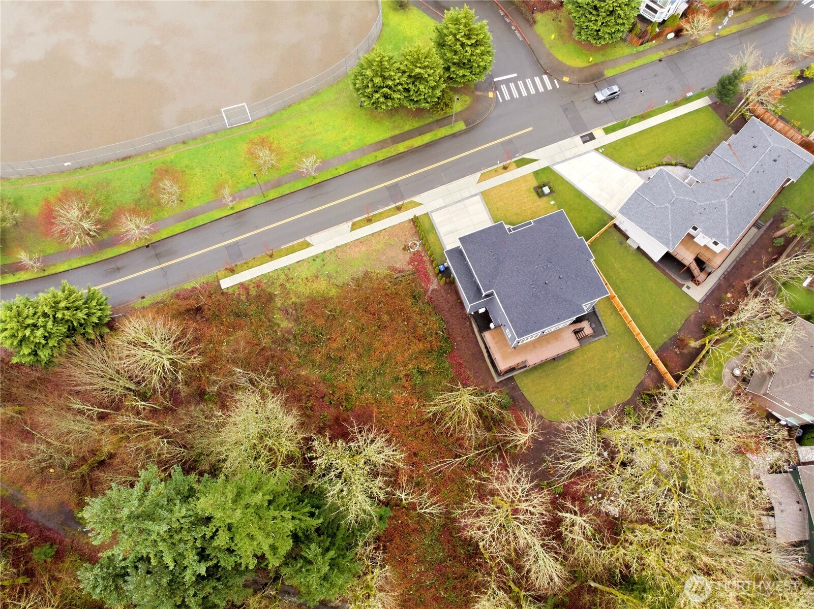 13655 Southeast 88th Way Newcastle, WA 98059 - Photo 14 of 29 an aerial view of a house with a yard and ocean view