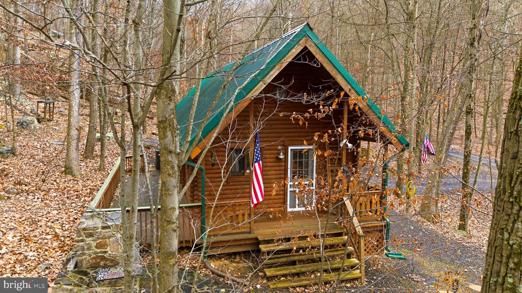 333 Rouse Mountain Road Great Cacapon, WV 25422 - Photo 31 of 54 front view of a building
