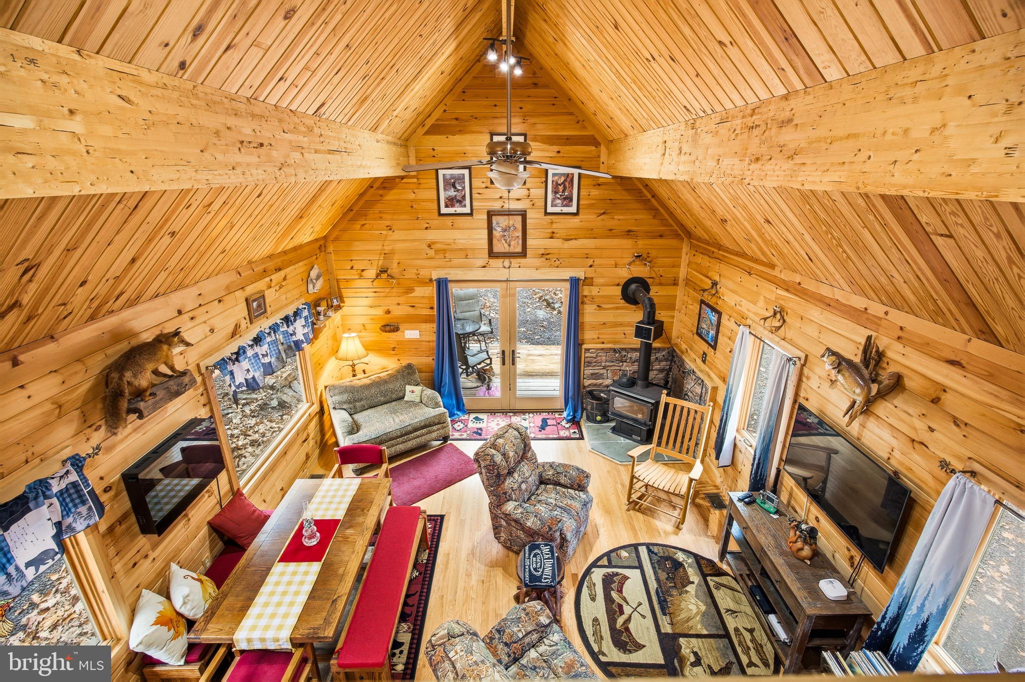 333 Rouse Mountain Road Great Cacapon, WV 25422 - Photo 4 of 54 a front view of a fireplace