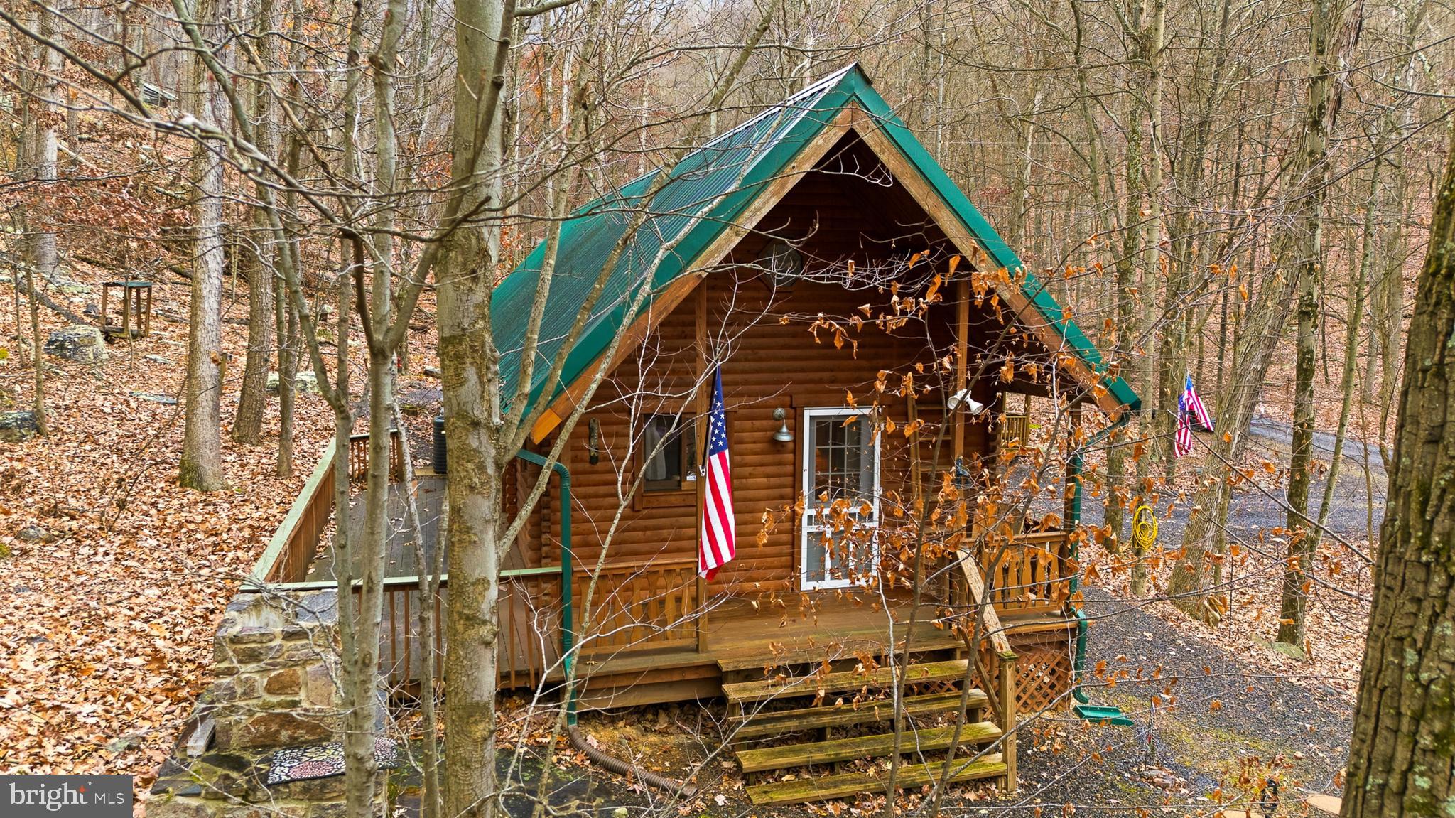 333 Rouse Mountain Road Great Cacapon, WV 25422 - Photo 45 of 54 front view of a building