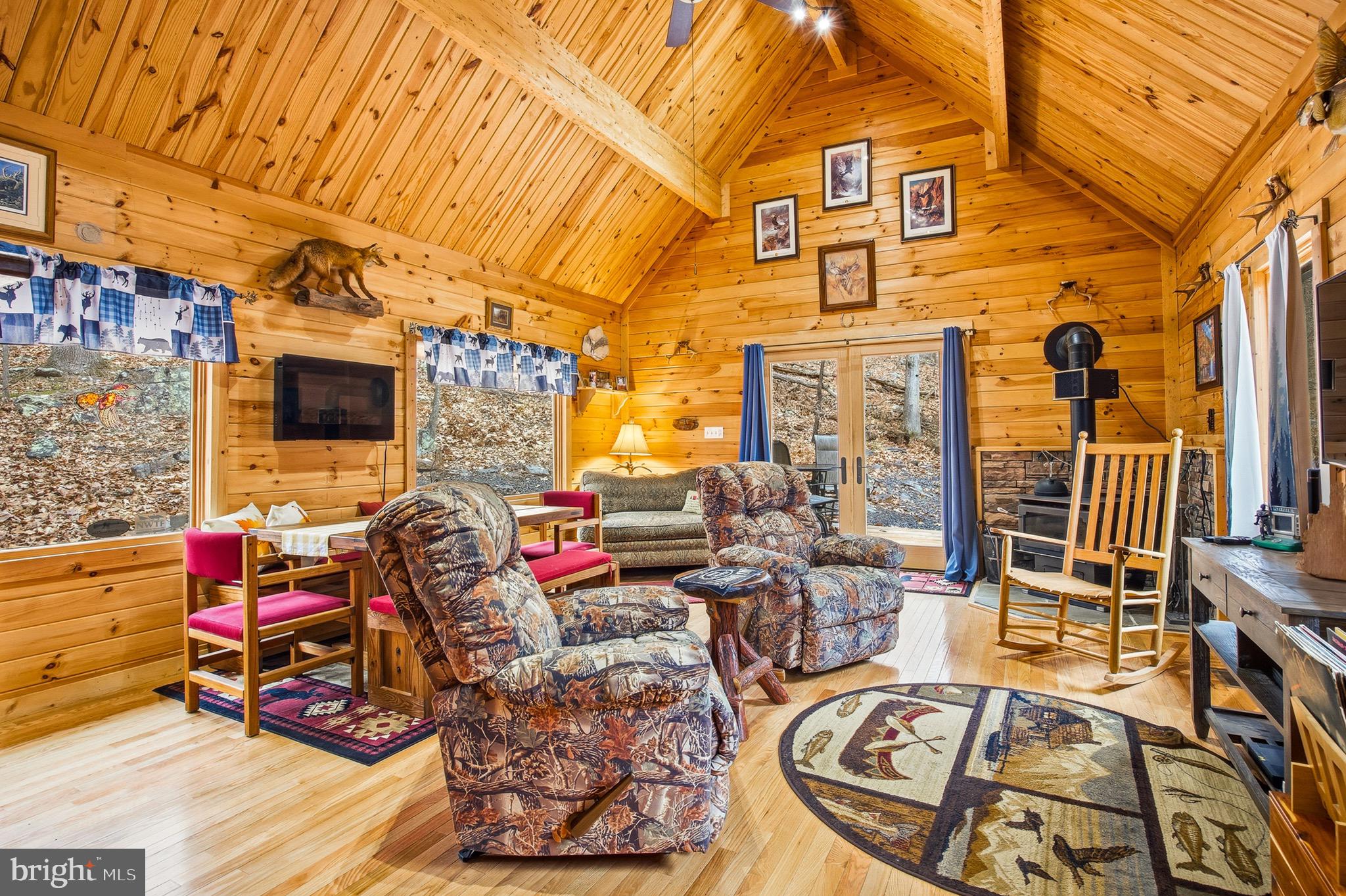 333 Rouse Mountain Road Great Cacapon, WV 25422 - Photo 8 of 54 a outdoor space with furniture