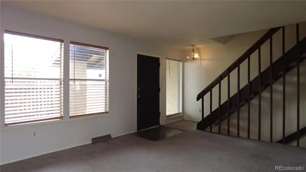 a view of an entryway with staircase