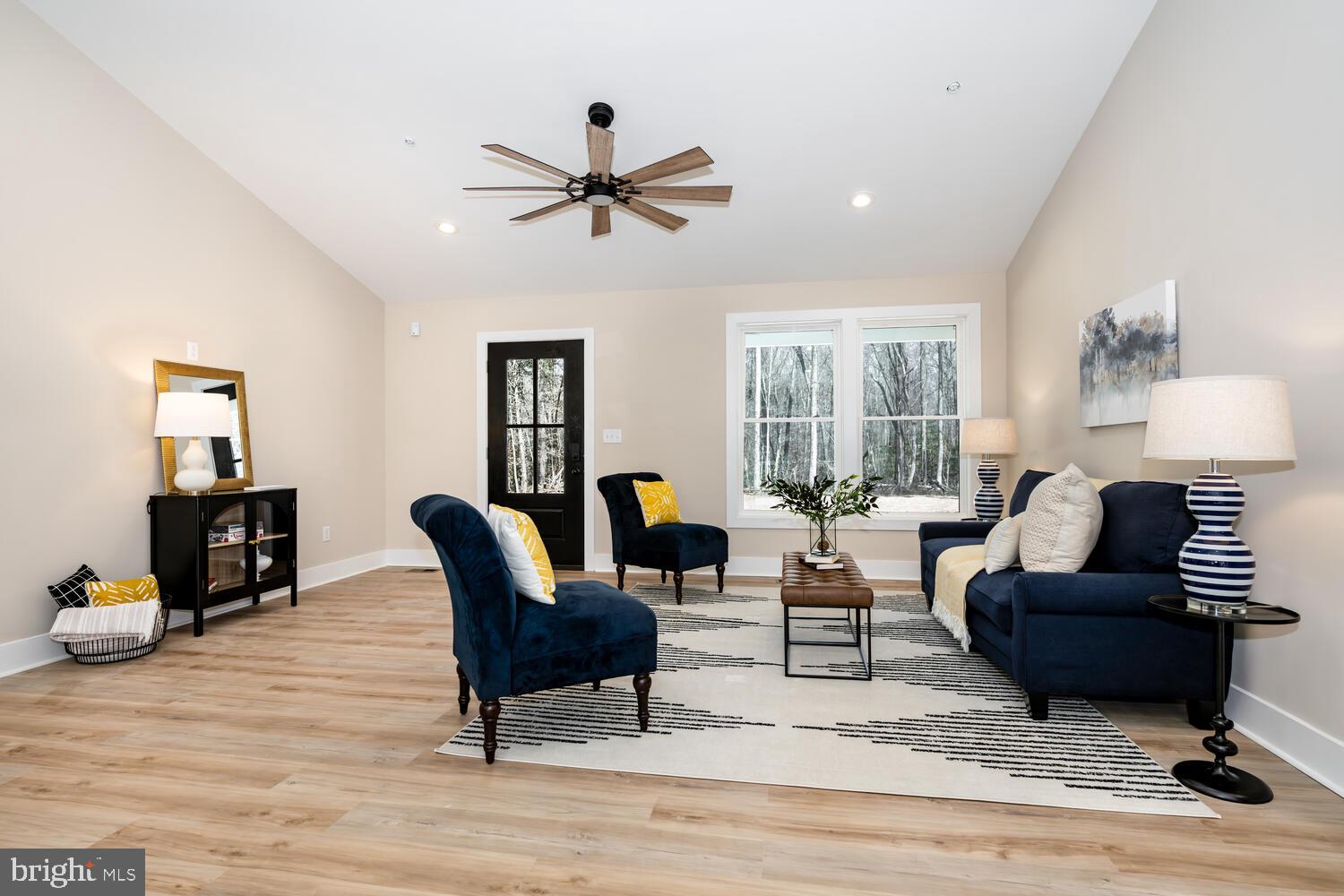 206 Springbrook Lane Millington, MD 21651 - Photo 14 of 36 a living room with furniture and a wooden floor