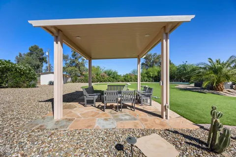 a view of a golf course with a lake