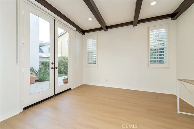 a view of a kitchen with a fireplace a sink and a large window