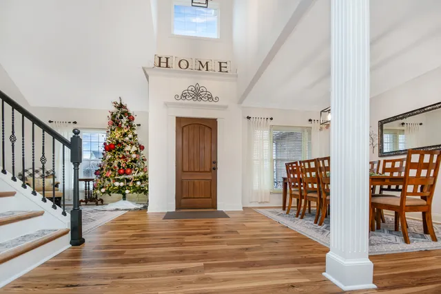 a view of front door and wooden floor