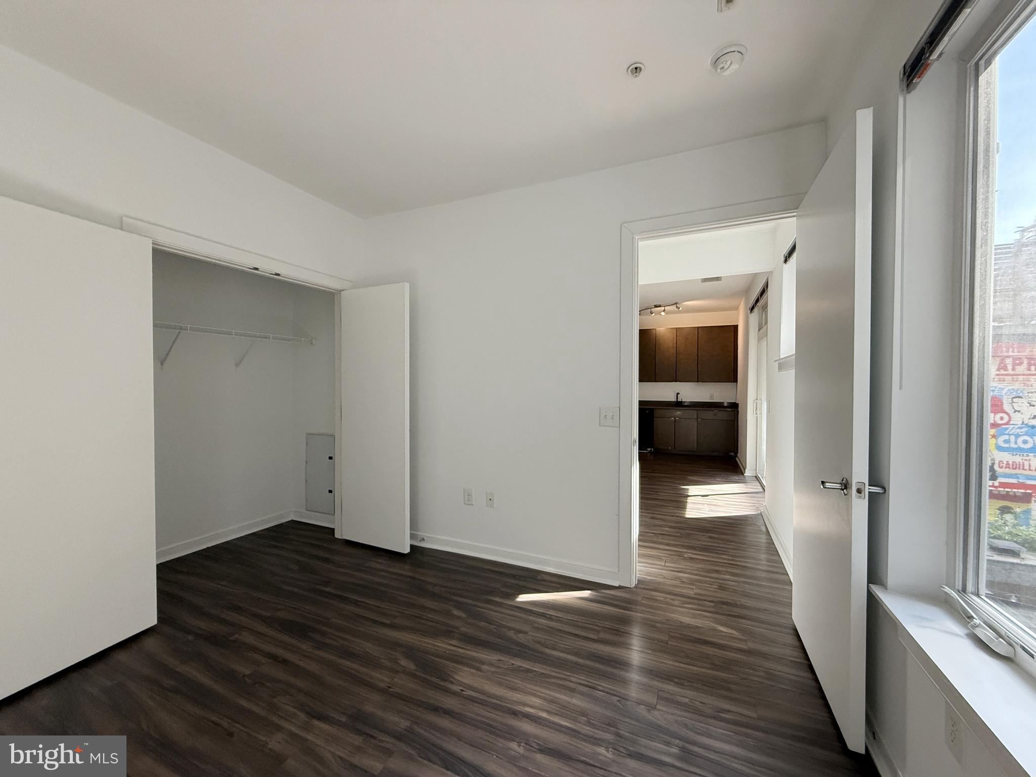 1250 9th Street Northwest, Unit 218 Washington, DC 20001 - Photo 10 of 18 a view of a hallway with wooden floor
