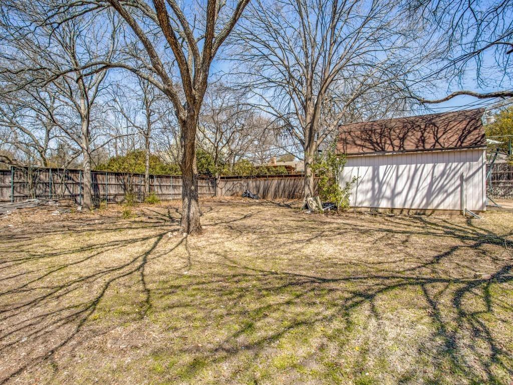 7027 Alpha Road, Unit 1 Dallas, TX 75240 - Photo 7 of 8 a view of large yard with patio