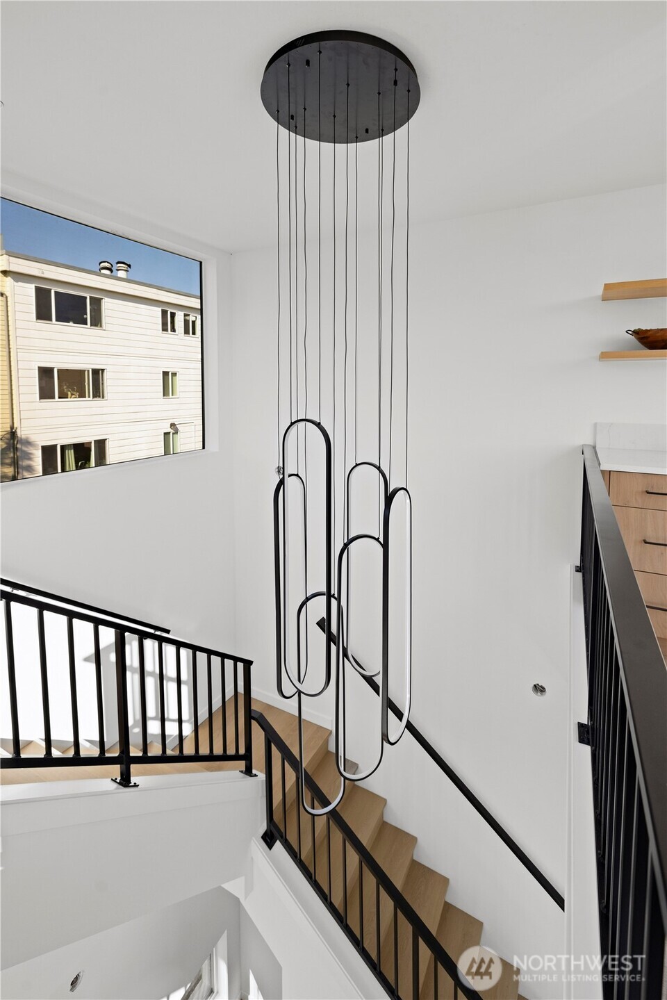 3421 Albion Place North Seattle, WA 98103 - Photo 27 of 38 a view of a hallway with a door