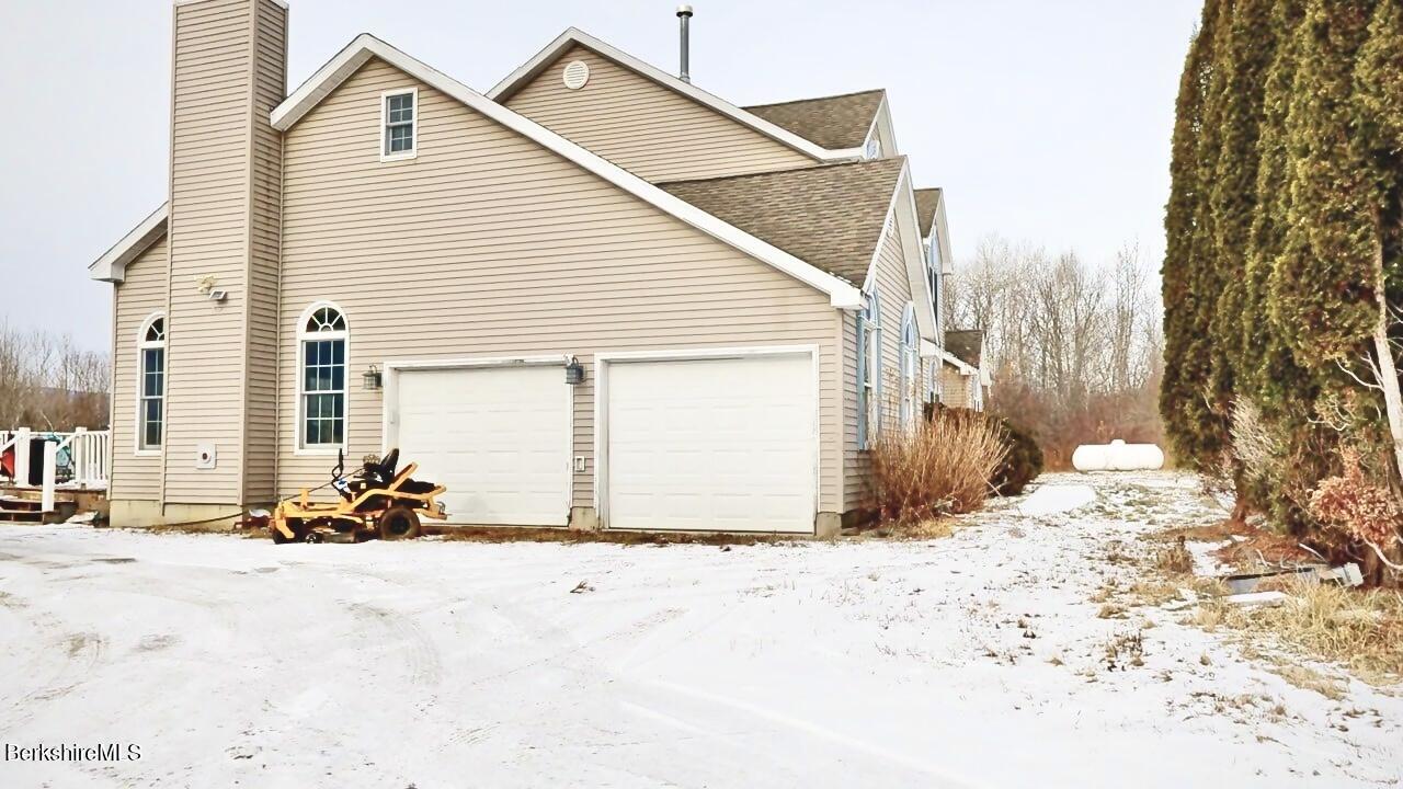 867 Notch Road Cheshire, MA 01225 - Photo 32 of 37 a view of a house with a outdoor space