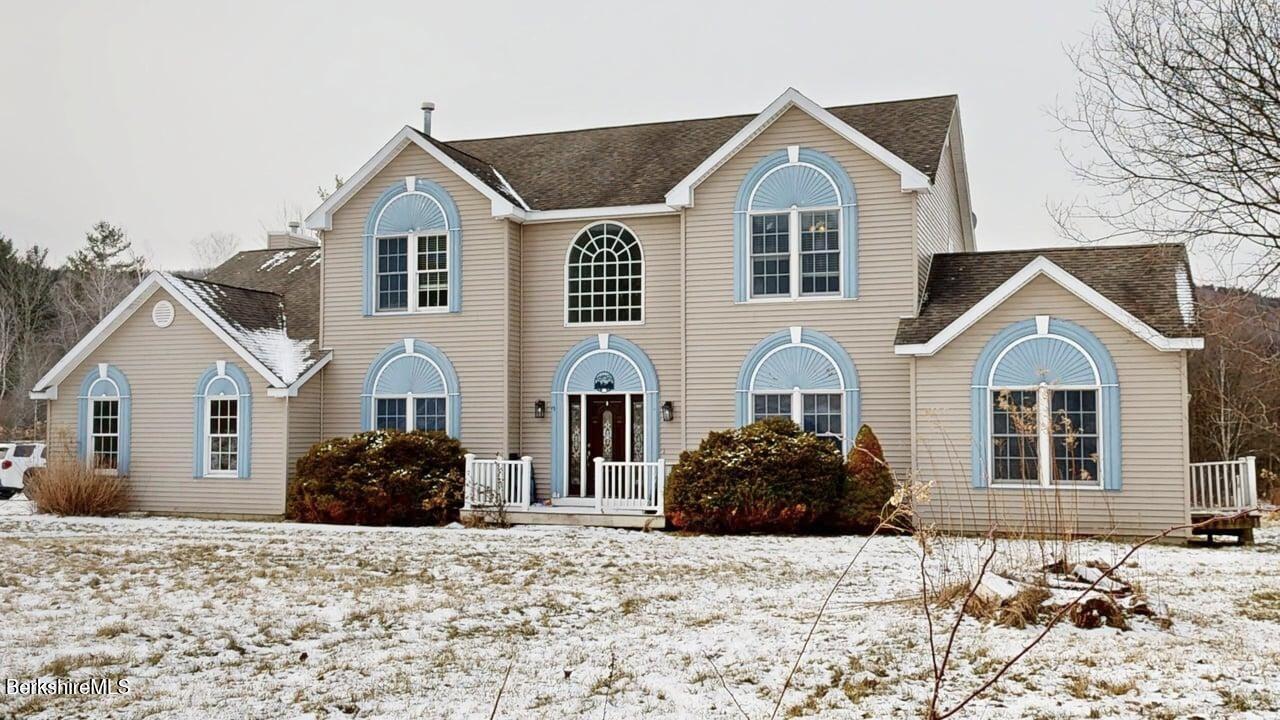 867 Notch Road Cheshire, MA 01225 - Photo 8 of 37 a front view of a house with a yard