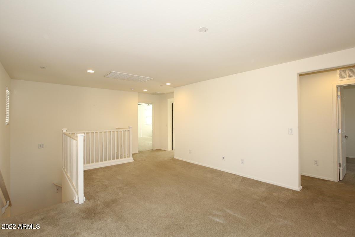 4717 East Betty Elyse Lane Phoenix, AZ 85032 - Photo 11 of 25 a view of hallway with stairs