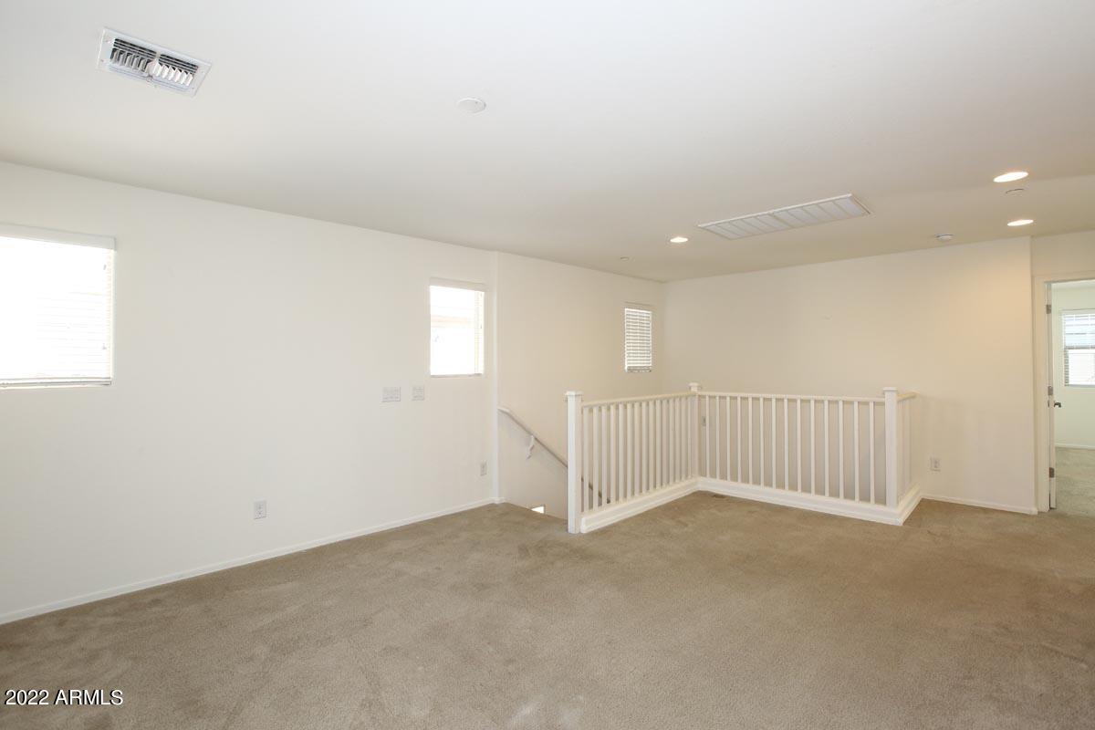4717 East Betty Elyse Lane Phoenix, AZ 85032 - Photo 12 of 25 a view of an empty room