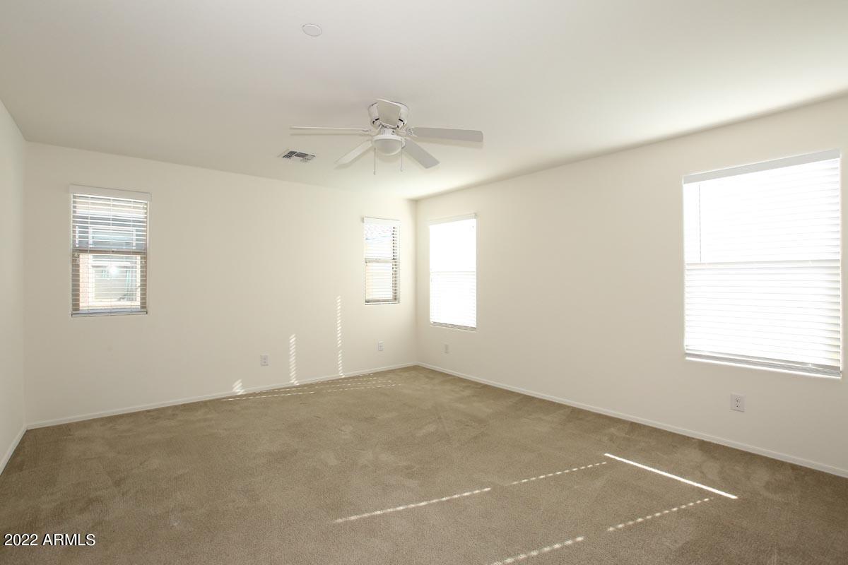 4717 East Betty Elyse Lane Phoenix, AZ 85032 - Photo 18 of 25 an empty room with a window