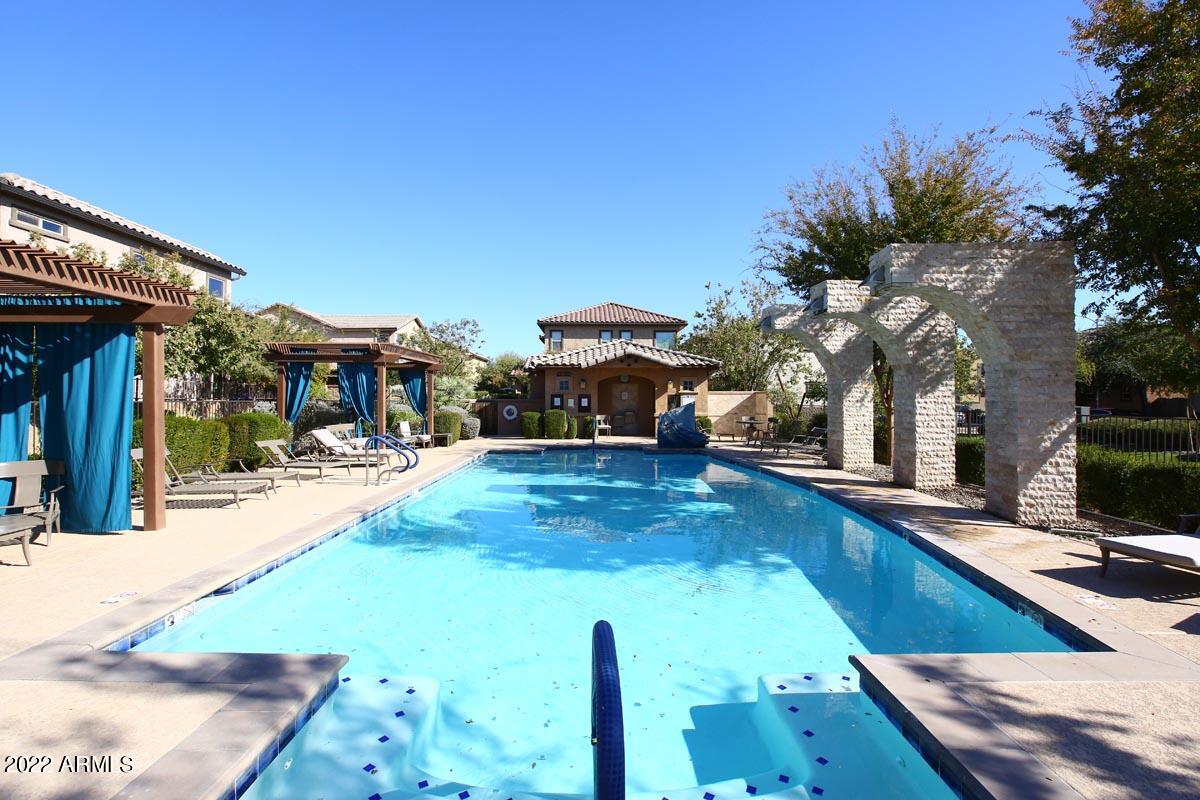4717 East Betty Elyse Lane Phoenix, AZ 85032 - Photo 25 of 25 a view of a house with swimming pool