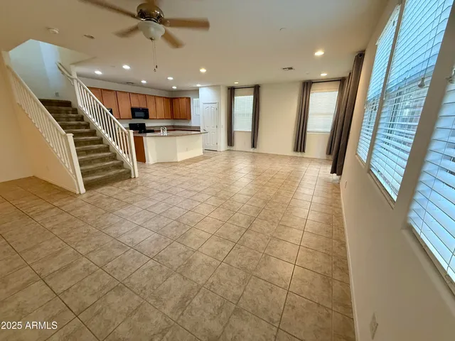 a view of a hall with kitchen and sink