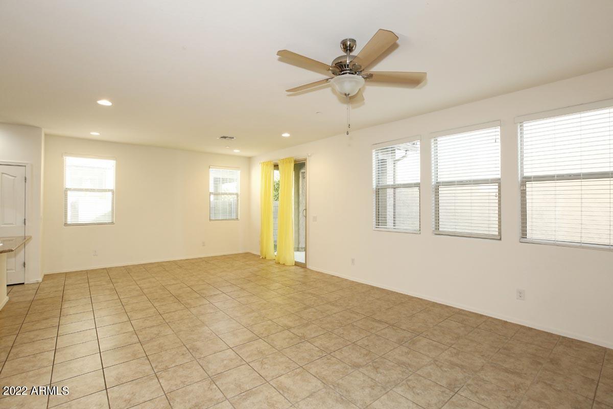 4717 East Betty Elyse Lane Phoenix, AZ 85032 - Photo 6 of 25 a view of an empty room with a window