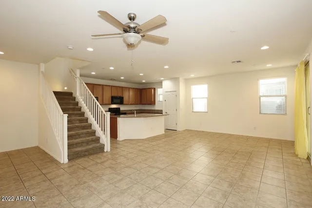 a view of kitchen with furniture and window