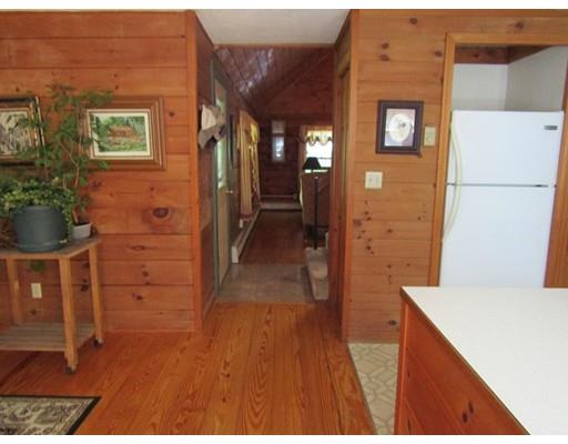 171 Nichewaug Road Petersham, MA 01366 - Photo 11 of 16 a view of hallway with wooden floor