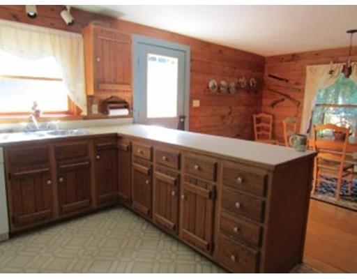 171 Nichewaug Road Petersham, MA 01366 - Photo 10 of 16 a spacious bathroom with a granite countertop double vanity sink and a window