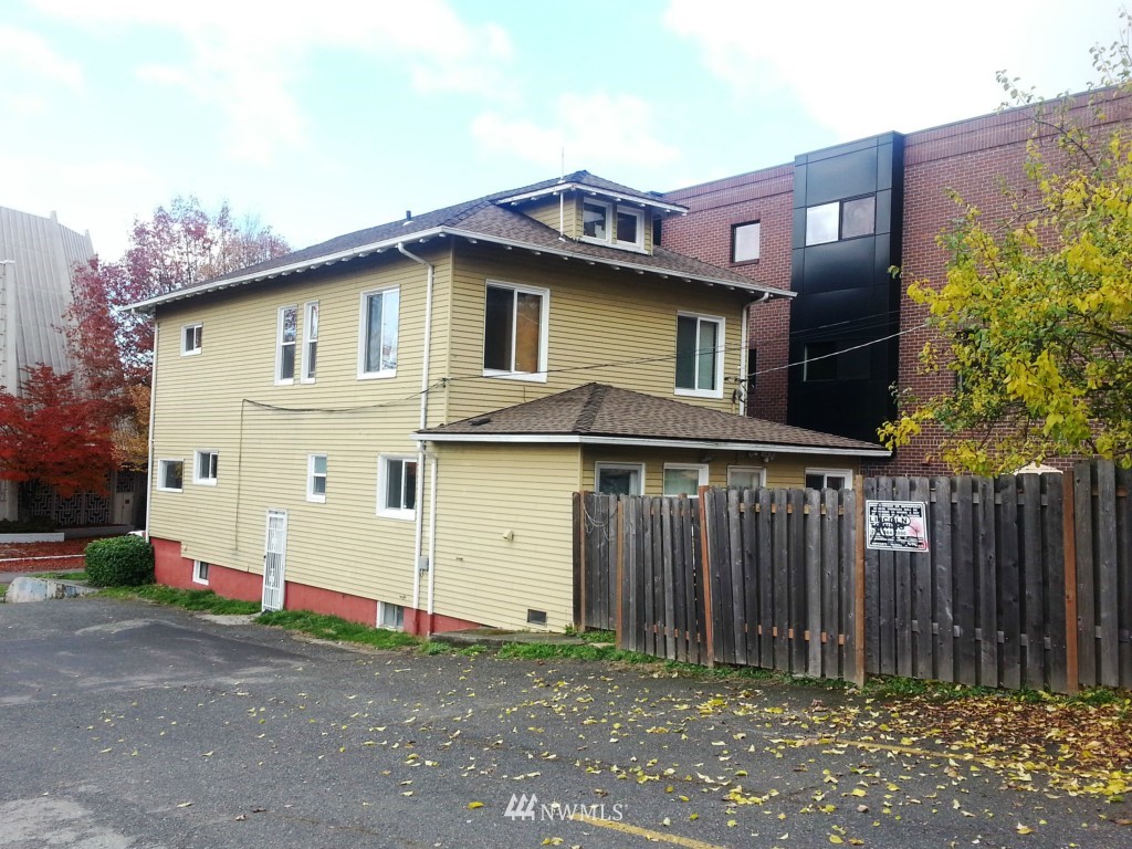 1428 16th Avenue Seattle, WA 98122 - Photo 3 of 3 a front view of a house with a garage