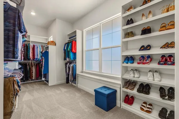 a utility room with sink dryer and washer