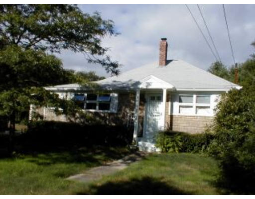 21 A Cahoon Road Wareham, MA 02532 - Photo 3 of 8 a front view of a house with a garden