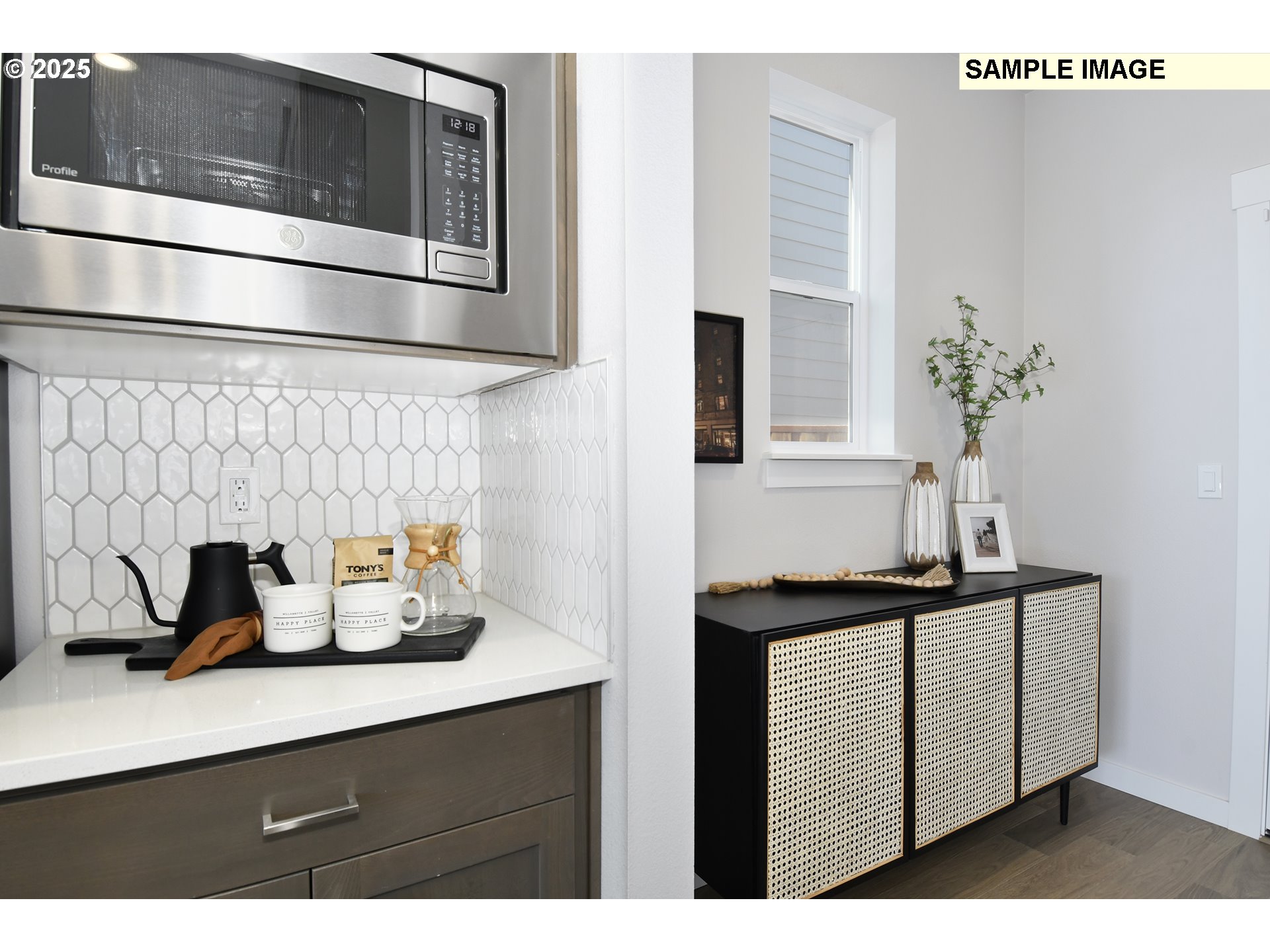 3103 Southwest 4th Avenue Battle Ground, WA 98604 - Photo 14 of 33 a kitchen with a sink and cabinets