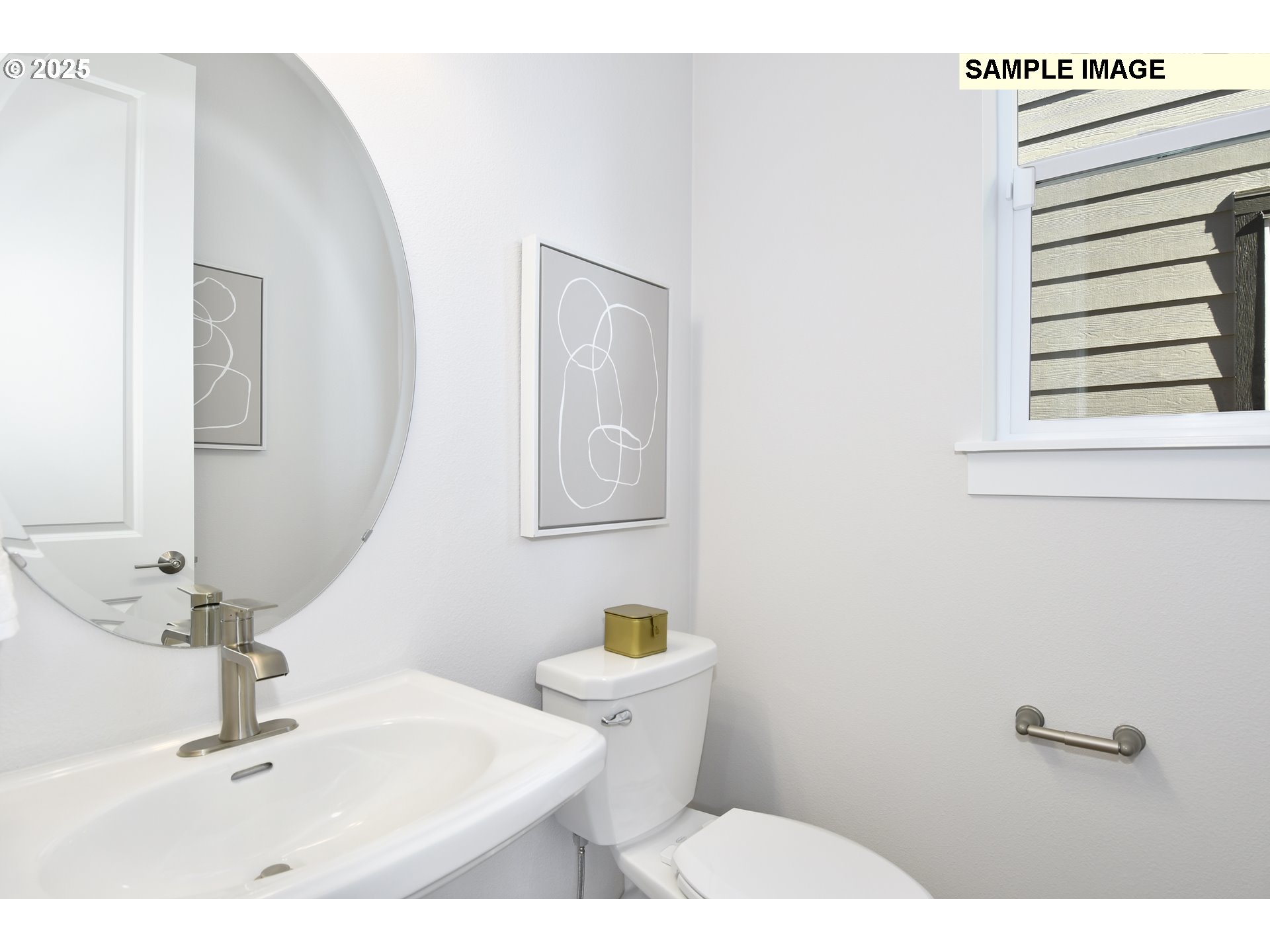 3103 Southwest 4th Avenue Battle Ground, WA 98604 - Photo 26 of 33 a bathroom with a sink a toilet and mirror