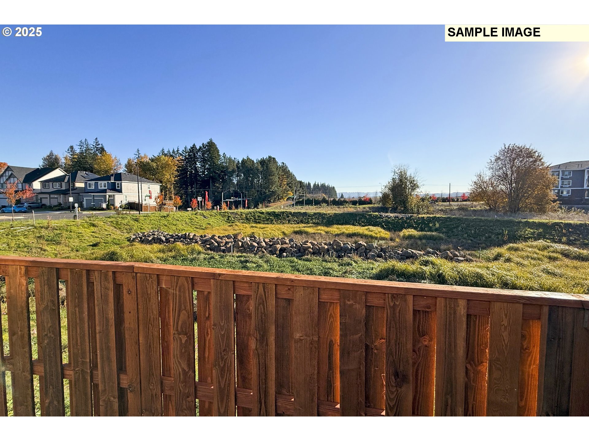 3103 Southwest 4th Avenue Battle Ground, WA 98604 - Photo 6 of 33 a view of a wooden fence and outside space