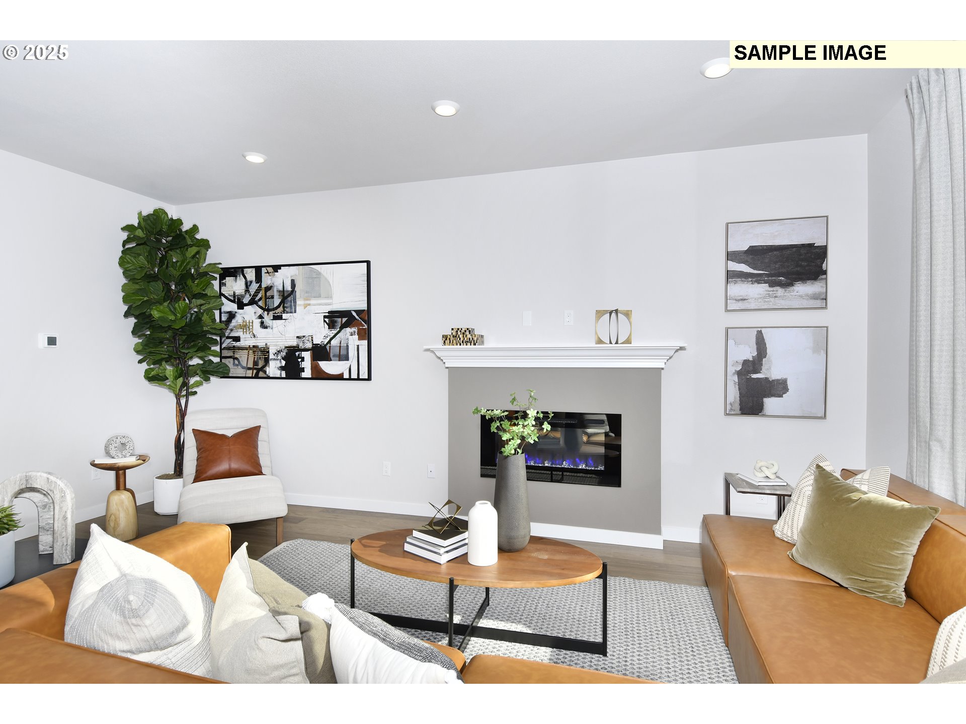 3103 Southwest 4th Avenue Battle Ground, WA 98604 - Photo 7 of 33 a living room with furniture and a fireplace