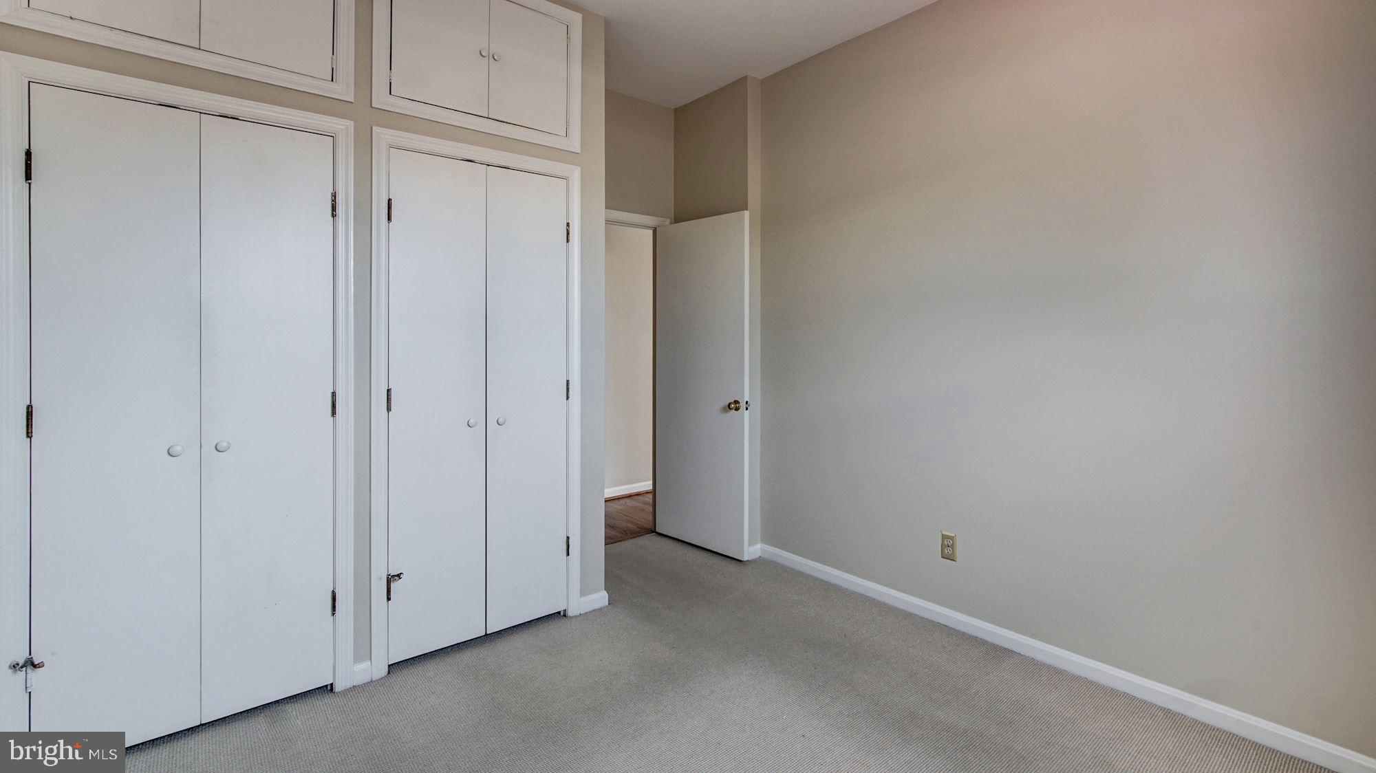 2101 N Street Northwest, Unit 301 Washington, DC 20037 - Photo 13 of 16 Ample closet space in bedroom