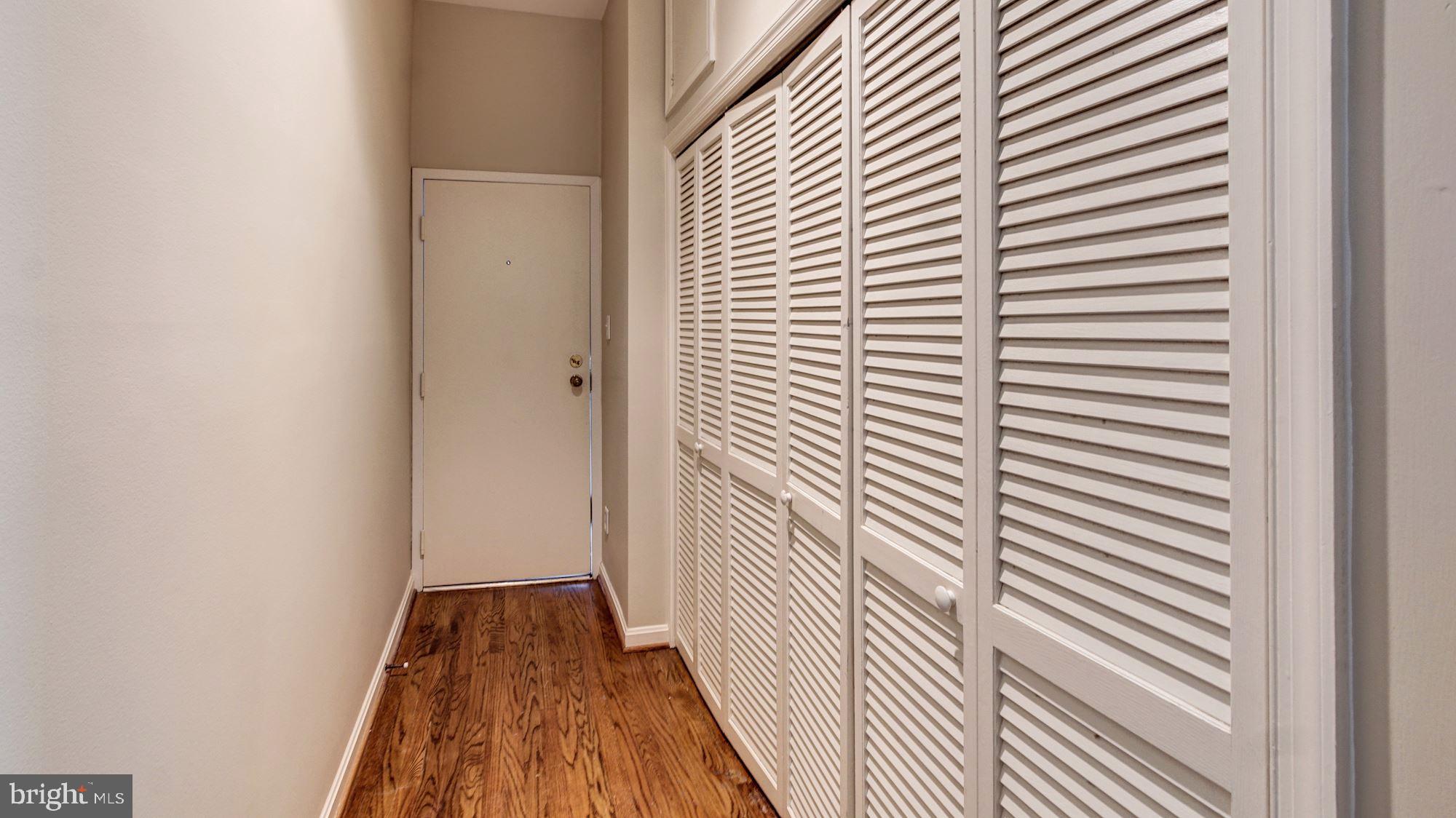 2101 N Street Northwest, Unit 301 Washington, DC 20037 - Photo 4 of 16 Spacious entrance way with closets