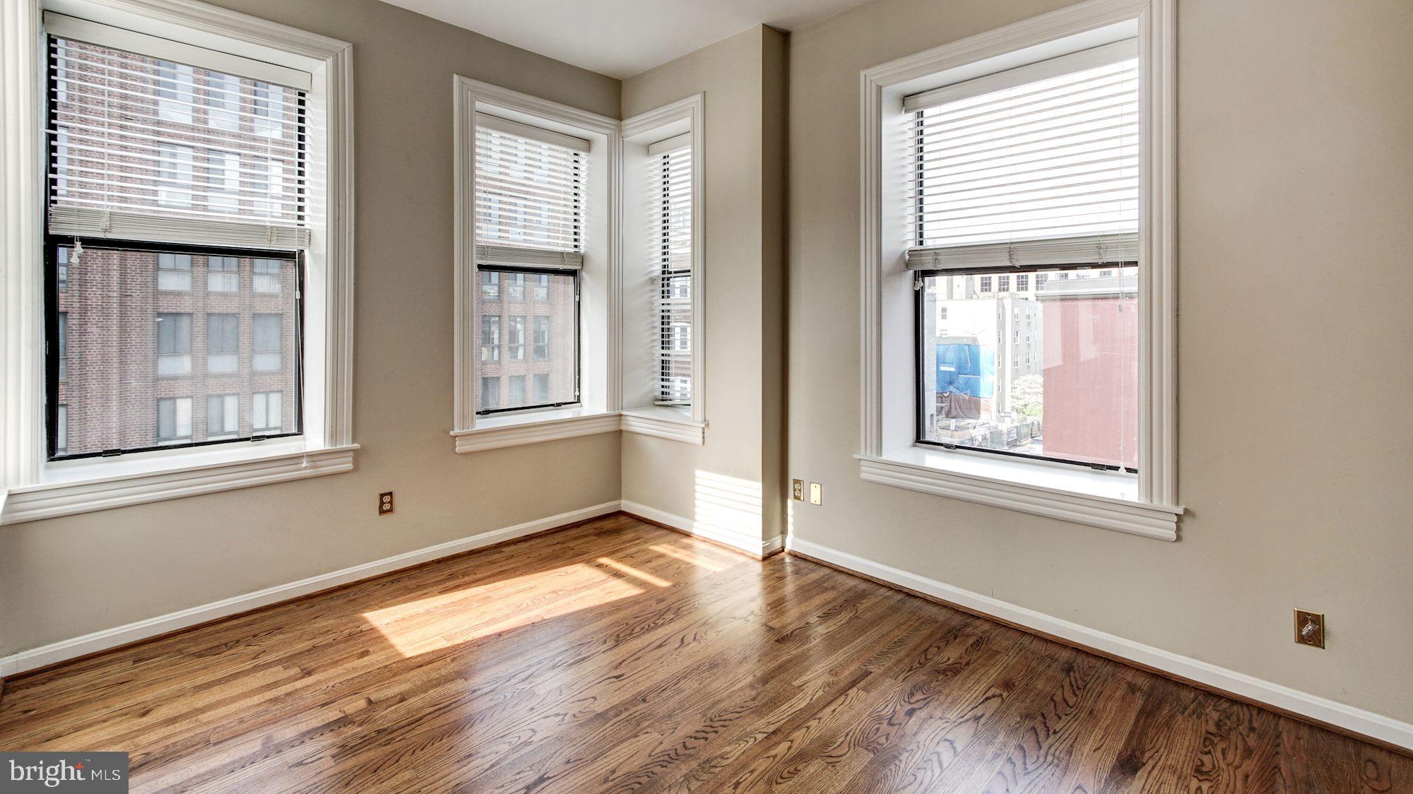 2101 N Street Northwest, Unit 301 Washington, DC 20037 - Photo 5 of 16 Gorgeous windows with custom Venetian blinds