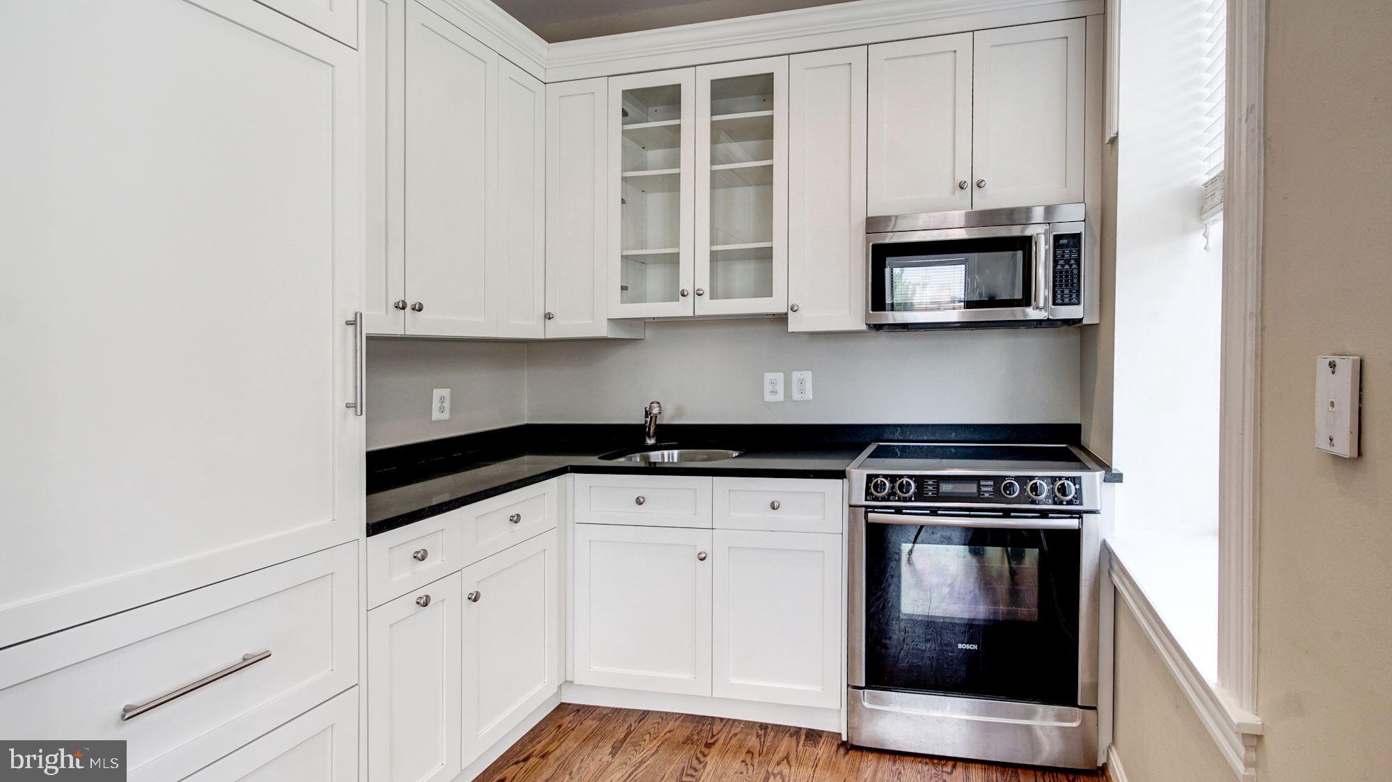 2101 N Street Northwest, Unit 301 Washington, DC 20037 - Photo 7 of 16 Stunning kitchen with high-end appliances
