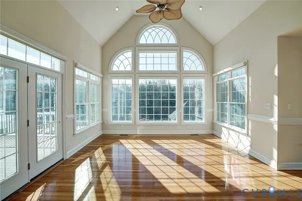 a view of an entryway with a floor to ceiling window