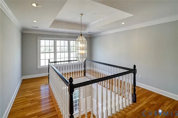 a view of entryway with wooden floor