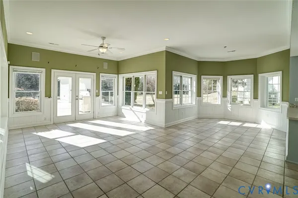 a view of an entryway with kitchen