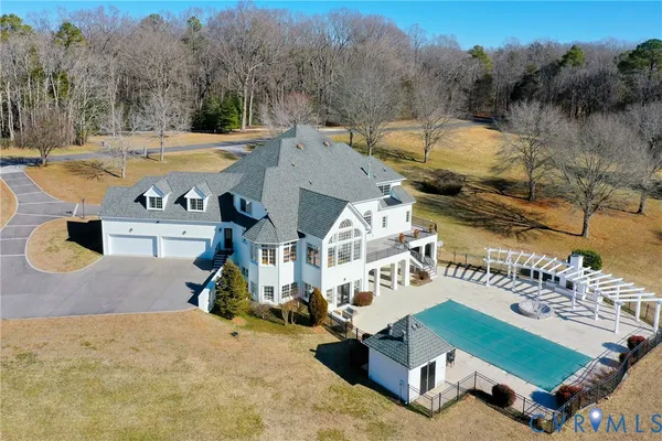 a view of a house with a swimming pool